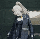 a girl with a ponytail is wearing a jacket with a badge that says a6p8