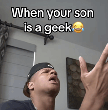 a man is crying with a caption that says when your son is a geek