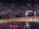 a basketball game is being played between the portland trail blazers and thetoronto raptors