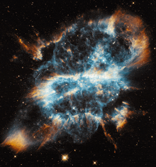 a blue and orange nebula with a bright star in the middle