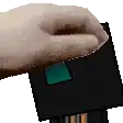 a close up of a person 's hand holding a black disk