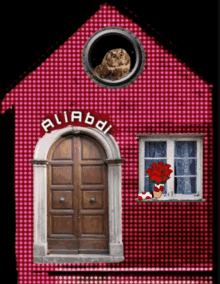 a red house with the word aliadoi on the top