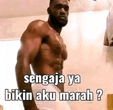 a shirtless man with a beard is standing in a bathroom with a meme .