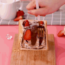 a slice of bread with strawberries and chocolate on it