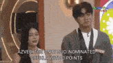 a man and a woman are standing next to each other with the words azver the only duo nominated shukla with 3 points behind them