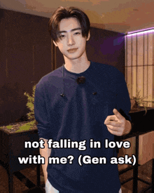 a picture of a young man with the caption " not falling in love with me ? ( gen ask ) "