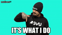 a man wearing a svu hoodie says it 's what i do on a blue background