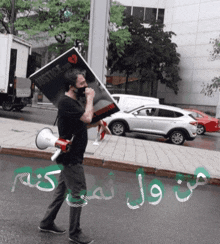 a man walking down the street holding a sign that says justice