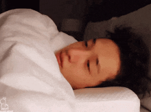 a man is laying in bed with his eyes closed and the word do not report on the bottom right