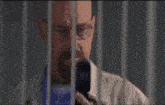 a blurry photo of a woman standing next to a man in a hallway