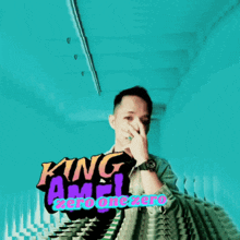 a man covering his face in front of a sign that says king angel zero one zero