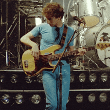 John Deacon Playing Guitar GIF