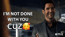 a man in a suit says that he is not done with you cuz