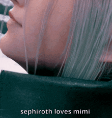 a close up of a person 's face with the words sephiroth loves mimi written below it