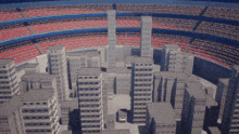 an aerial view of a city with a stadium filled with people