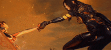 a woman in a black suit is reaching out to another woman