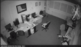 a black and white photo of an office with the words office on the bottom