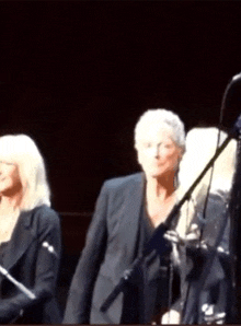 a blurred image of a group of people on a stage