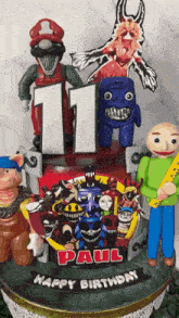 a birthday cake for paul with a number 11 on it