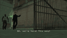two men in a video game are standing next to each other and one of them says " ah we 're here "