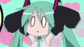 a close up of a cartoon character with headphones on her head and a surprised look on her face .