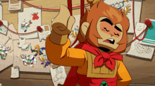 a cartoon monkey is standing in front of a bulletin board with drawings on it