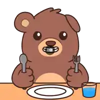 a cartoon bear is sitting at a table with a plate and a fork and spoon