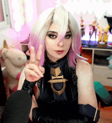 a woman giving a peace sign while wearing a wig