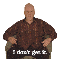 a man in a striped shirt sits in a chair with the words i don 't get it written below him