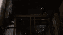a dark room with a sign on the wall that says ' rv '