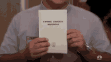 Be A Man Guide Book GIF - Be A Man Guide Book Instruction GIFs