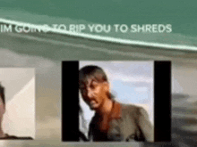 a man is standing in front of a screen with the words `` im going to rip you to shreds '' written on it .