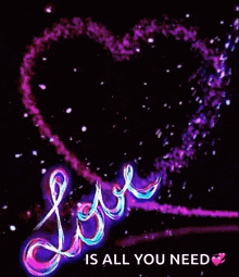 a heart with the words `` love is all you need '' written on it .