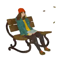 a woman sitting on a bench reading a book