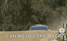 a car is driving down a dirt road with the words `` can rizzo come over '' .