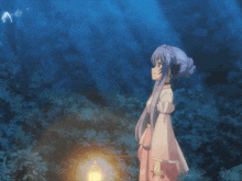 a girl in a kimono is reaching out towards a star