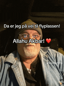 a man with a beard wearing glasses and a beanie says " da er jeg på vei til flyplassen ! "