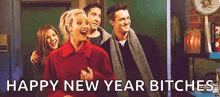a group of people standing next to each other with the words happy new year bitches below them