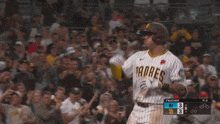 a padres baseball player is celebrating a home run