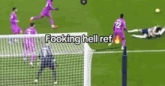 a soccer player is kicking a ball on a field with the words looking hell ref written on it .