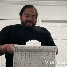 Opening A Present Viralhog GIF - Opening A Present Viralhog Surprise Gift GIFs