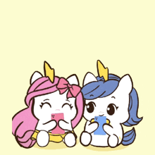 a couple of unicorns sitting next to each other with the words i love you above them