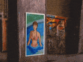 a painting of a woman in a bikini is hanging on a pillar