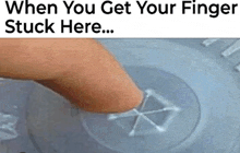 a person 's finger is stuck in a button that says " when you get your finger stuck here ... "