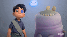 a boy with a blue eye stands next to a purple monster with elio written on the bottom