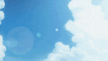a blue sky with white clouds and the sun shining through