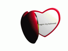 a heart shaped mirror with a picture of a dragon and the words " longan dragon my beloved "