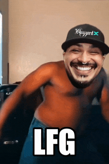 a shirtless man wearing a wizard hat is smiling and says lfg