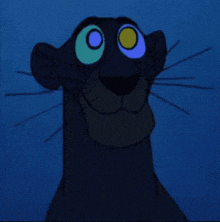a black panther with green and blue eyes is looking at the camera