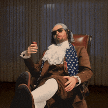 a man wearing a wig and sunglasses is sitting in a chair holding a can of coke